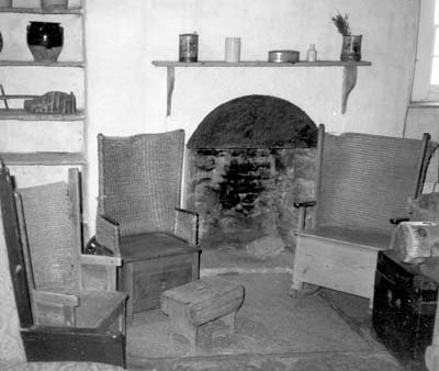 Three old Orkney chairs with backs woven of “simmons” (thick woven straw rope) — Corrigall Old Farm Museum, just off the A-986 highway on Mainland, Orkney Islands. Photo: Hinkle