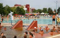 Bathers and sun worshipers relax in the thermal waters in Hajdúszoboszló.