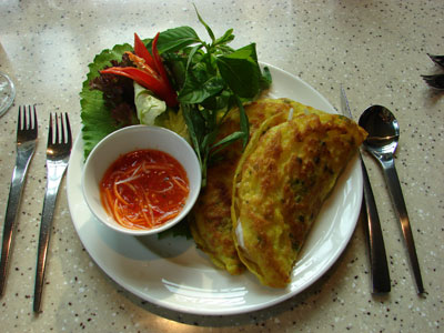  The finished pancake with a bowl of pickled carrots. Photo by Sandra Scott