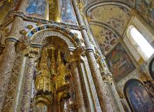 The church inside Tomar's Convento de Cristo, designed at the height of Portugal's sea power, is covered with elaborate motifs. Photo by Rick Steves