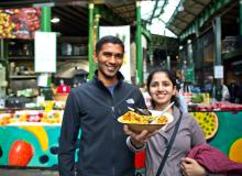 Borough Market, one of London’s numerous food halls and markets, can be a thrifty dining spot. Photo by Dominic Arizona Bonuccelli