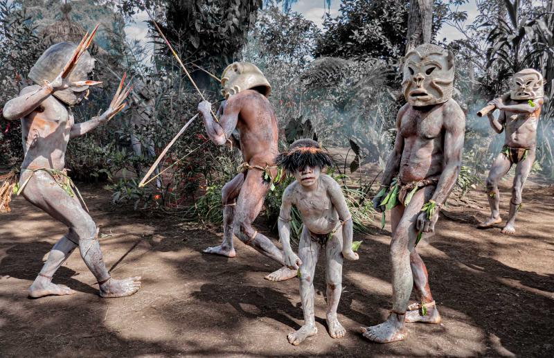 A performance by the mudmen of Papua New Guinea.